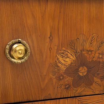 A Gustavian marquetry and gilt-brass mounted commode, late 18th century.