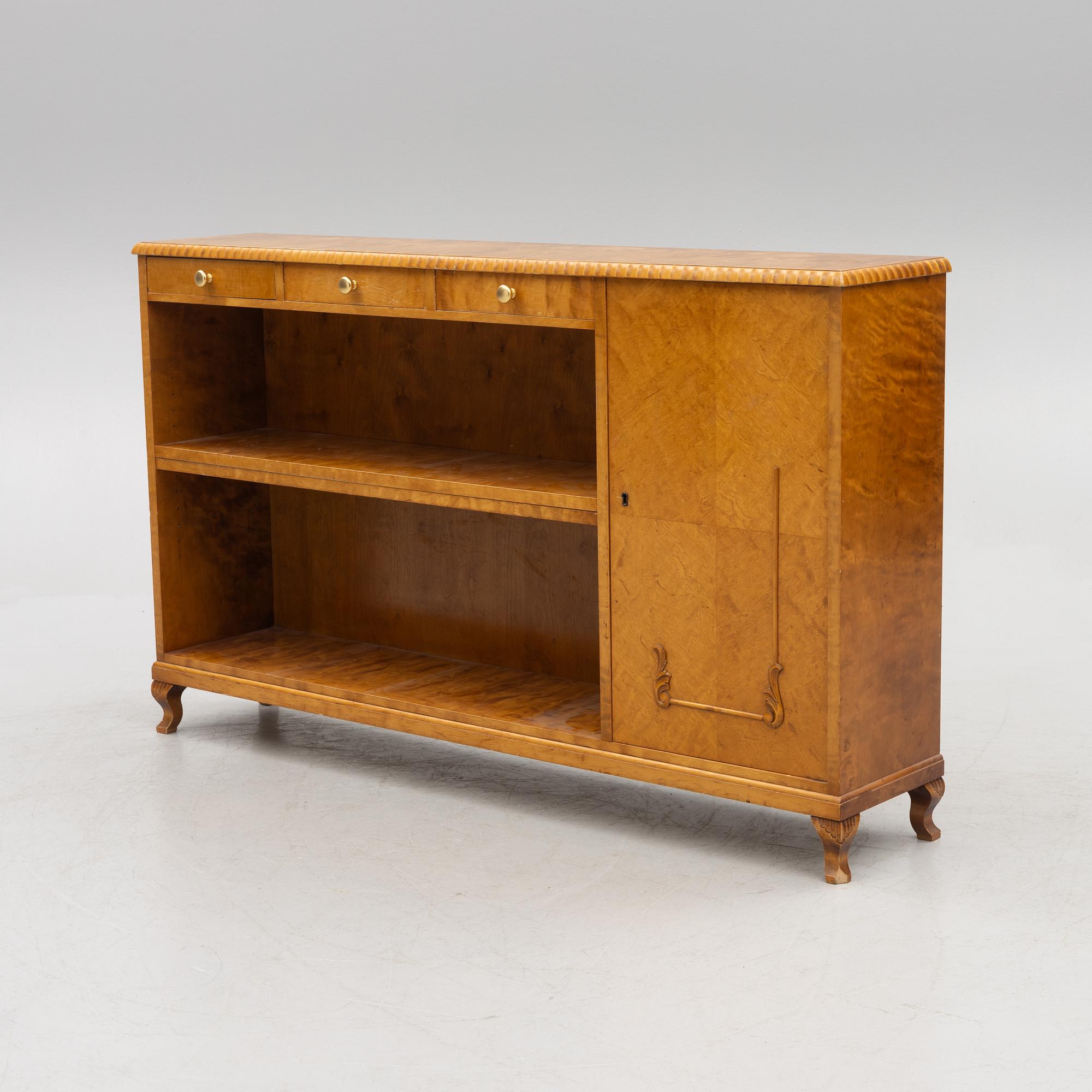 A bookcase with cabinet, 1940's.