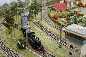 MÄRKLINBANA MED MÄRKLINTÅG. Bland annat tågset Märklin H0 28703. 1900-talets andra hälft.