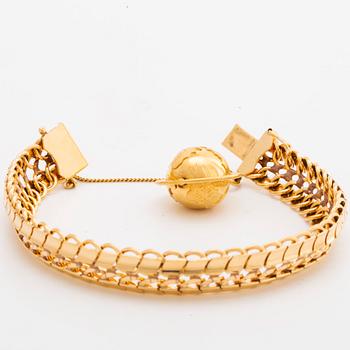 ARMBAND 18K guld m 1 berlock, 46,1 g.