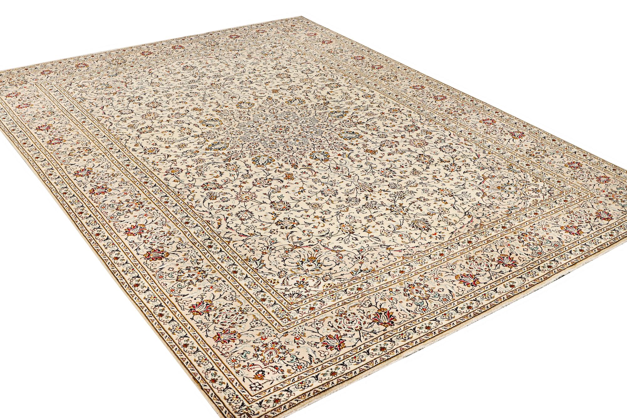 A Kashan carpet, a. 405 x 295 cm.