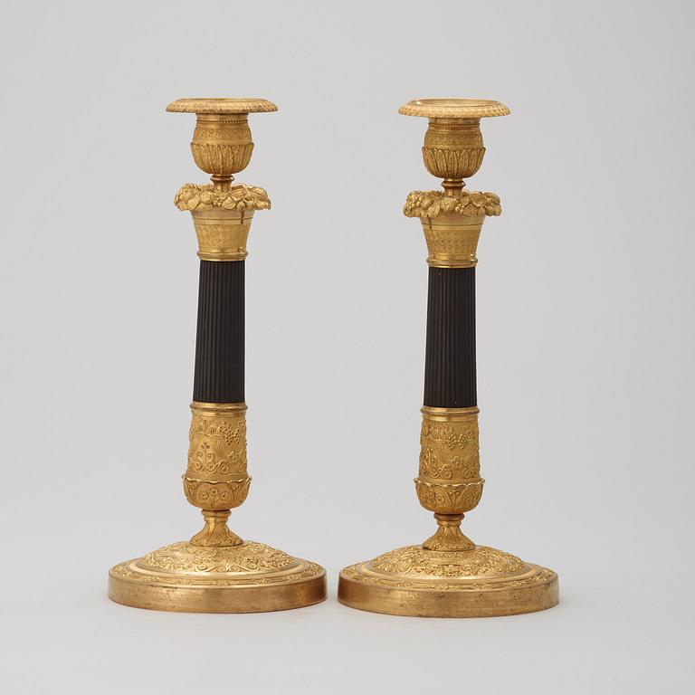 A pair of French Empire 19th century candlesticks.