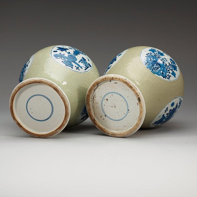 A set of two celadon glazed and blue and white jars, Qing dynasty, 18th Century.