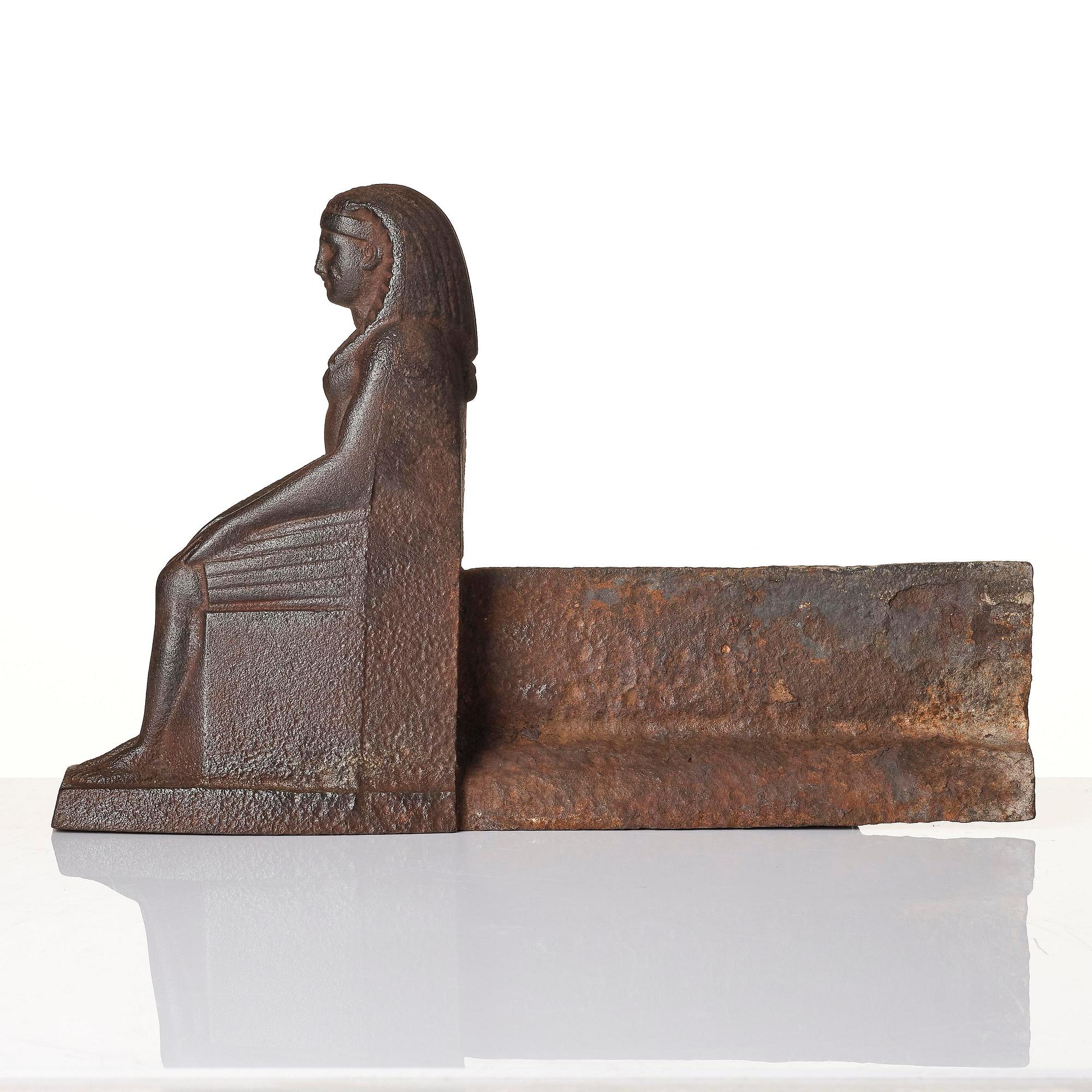 A pair of French Empire cast iron chenets, first part 19th century.