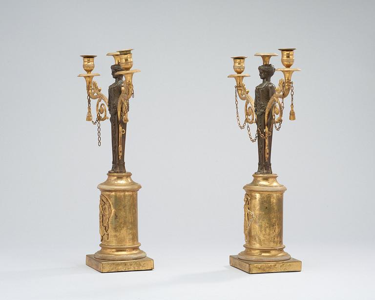 A pair of Swedish Empire 19th century two-light candelabra.