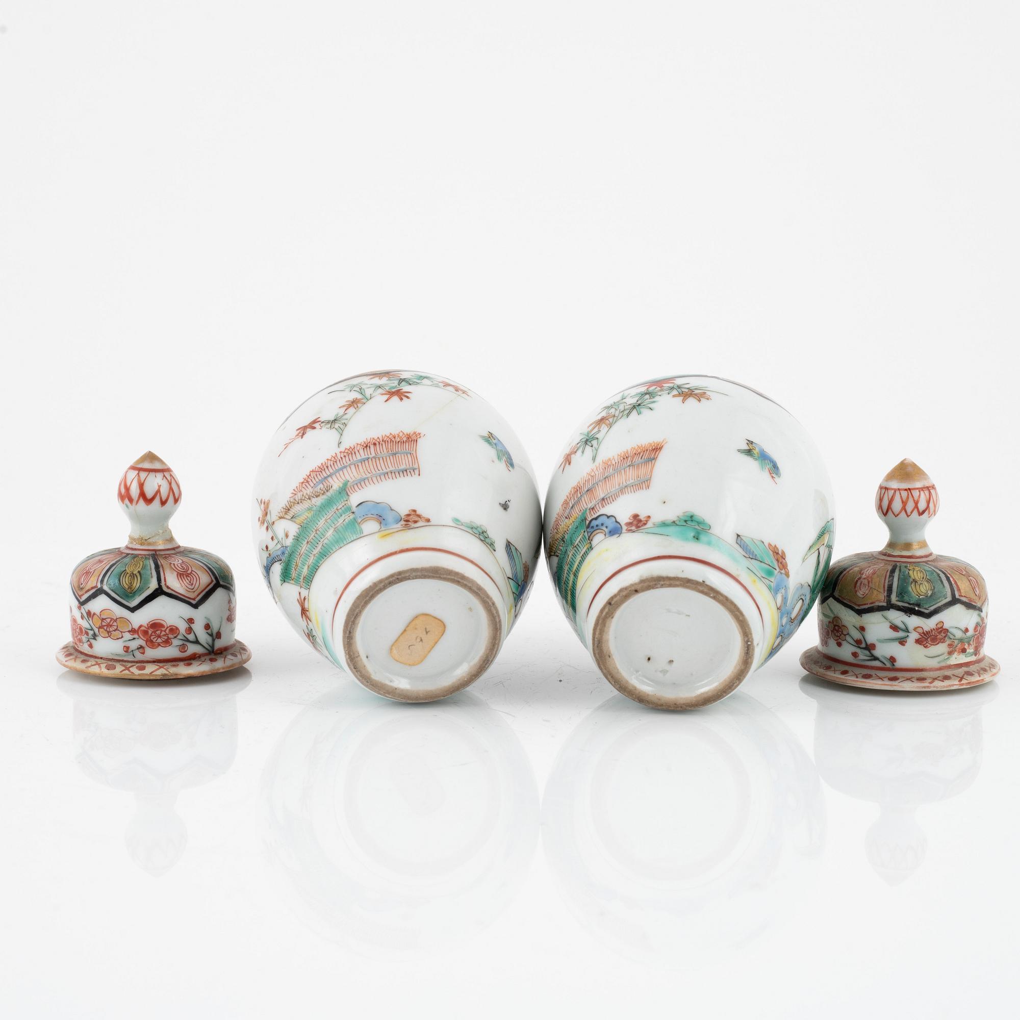 A pair of Japanese jars with covers, circa 1900.