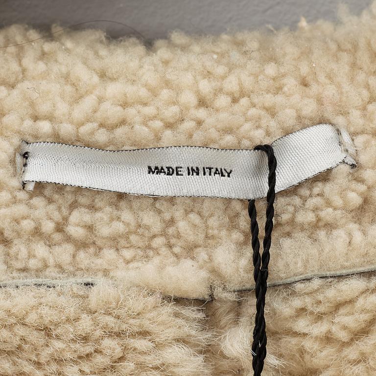 Yves Saint Laurent, Rive Gauche, rock, made in Italy, circa 2000.