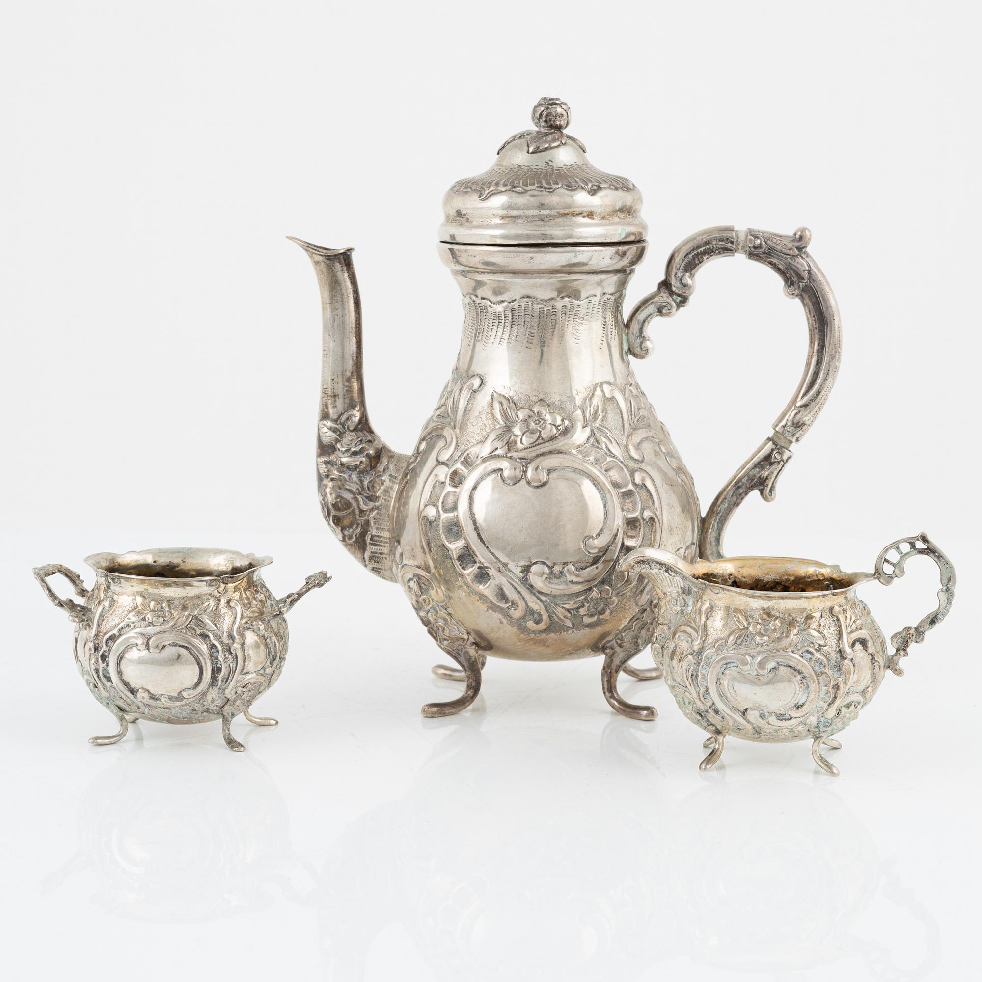 A three-piece Rococo style silver coffee set, possibly Norway, mid 20th century.
