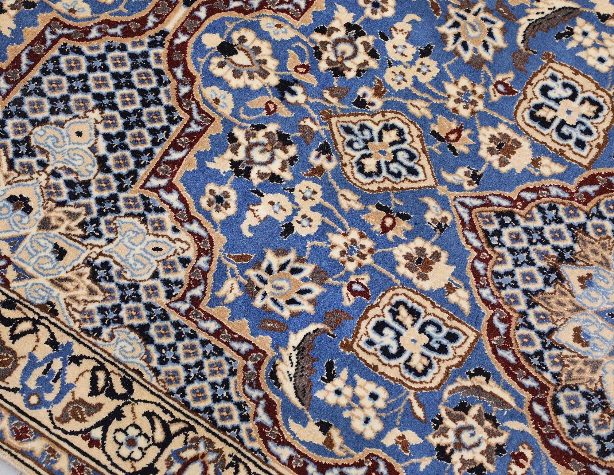A carpet,  Nain, part silk, so-called 9 LAA, approx. 382 x 99 cm.