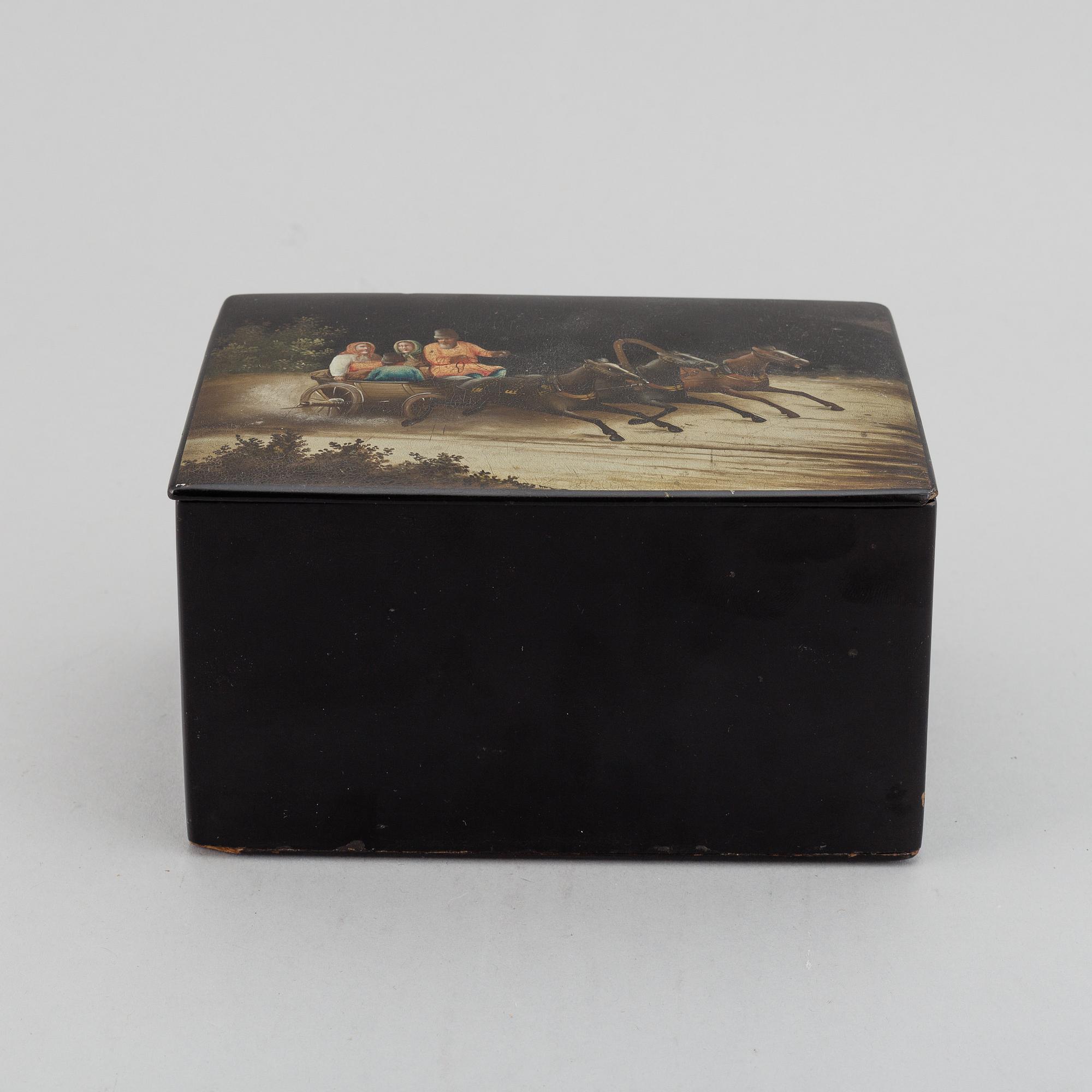 A lacquered lidded box, Russia, 1870s.