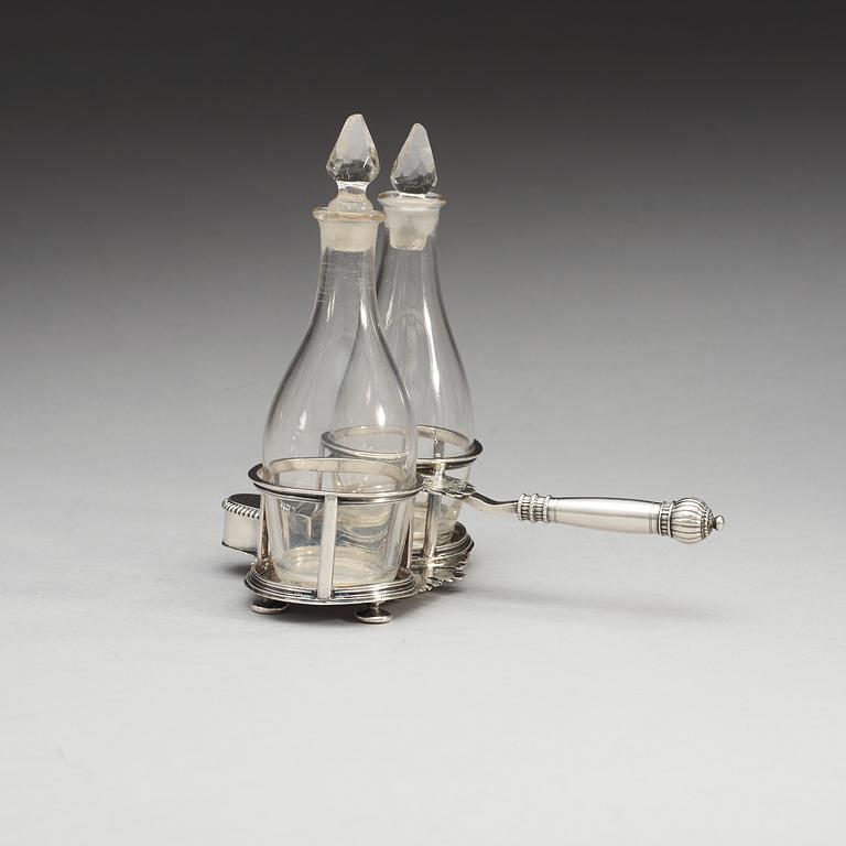 A German early 18th century silver cruet-set, makers mark of  Johann P. Riblinger, Augsburg 1708-1710.