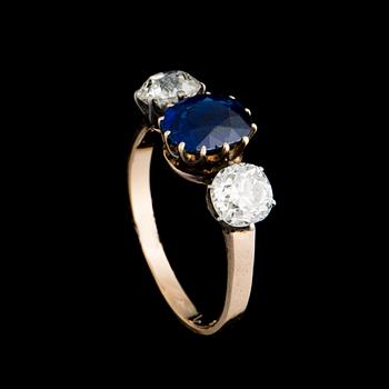 A RING, 14K (56) gold, sapphire, old cut diamonds. Assay mark Ivan Lebedkin, Moscow. Weight c. 2.4 g.