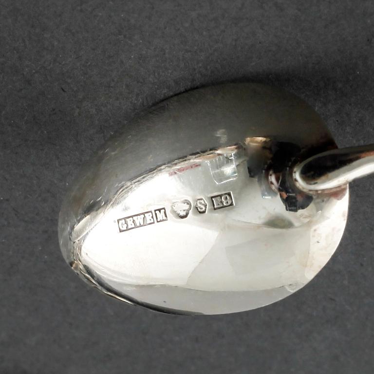 22 swedish silver spoons and one ladle, from the 19th and 20th century.