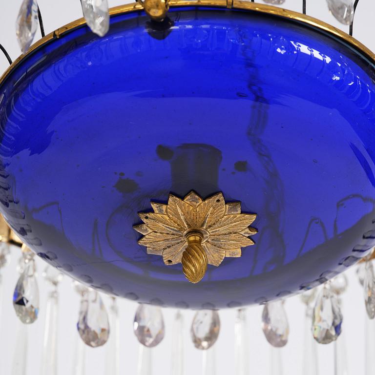 A late Gustavian five-light gilt brass and cut glass chandelier, Stockholm, late 18th century.