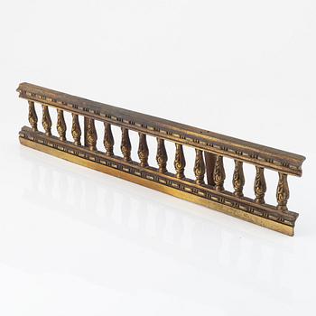 A brass fire grid in three pieces, late 19th century.