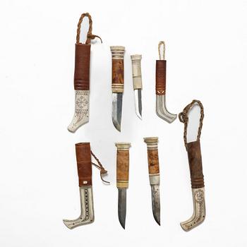 Eight knives, of which seven are half-horn knives, signed.