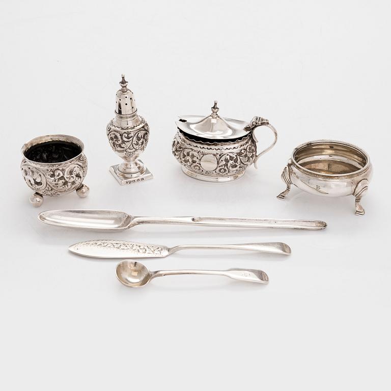 A  7-piece set of sterling silver tableware, England 1756 - 1911.