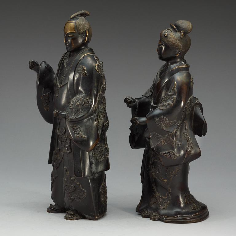 Two standing Japanese bronze sculptures of a Samurai and elegant lady, 18/19th Century.