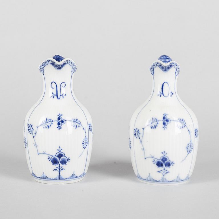 A pair of 'Blue Fluted' porcelain oil and vinegar pitchers and a tray, Royal Copenhagen, models 1179, 1180 and 1195.