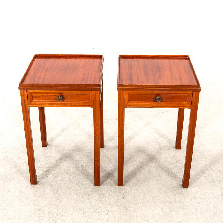 A pair of mahogany bedside tables by svensk möbelindustri second half of the 2+th century.