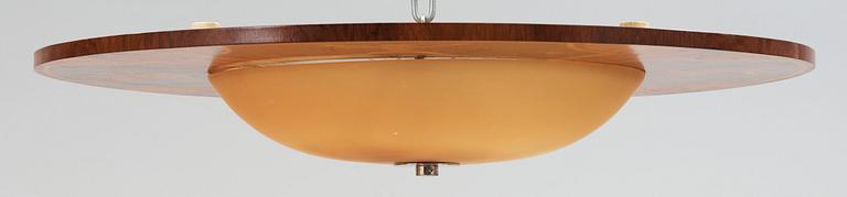 A Birger Ekman intarsia ceiling lamp with yellow shade, Mjölby Intarsia 1939.