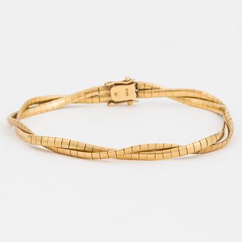 A two-rowed Omega link bracelet.