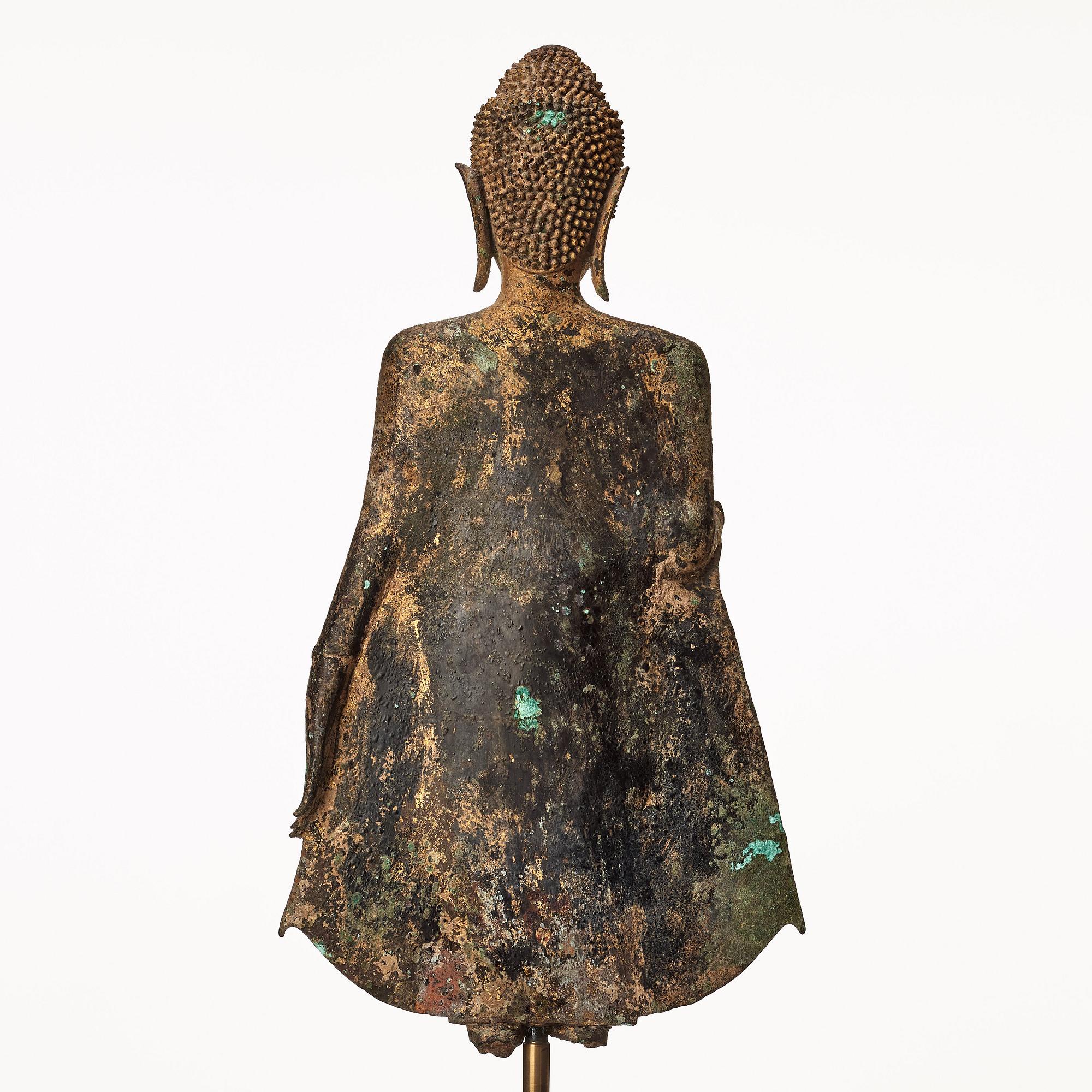 A standing figure of Buddha, Thailand, 18th Century.