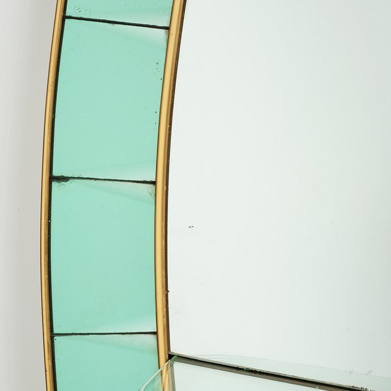 Italian designer, a wall mirror, 1950-60's. Emerald green tinted glass and brass frame.