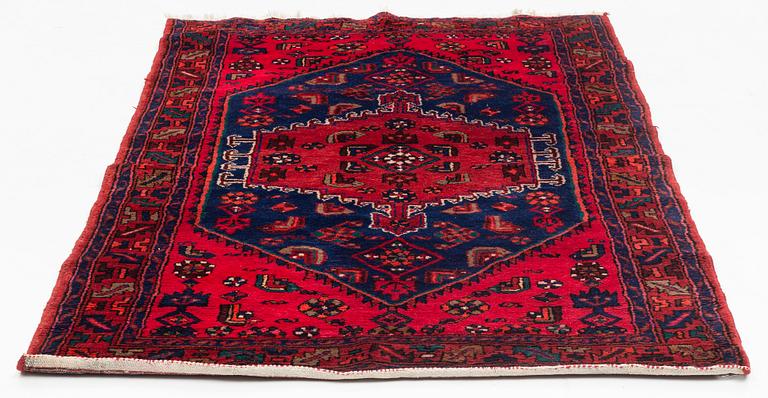 A carpet, circa 201 x 134 cm.