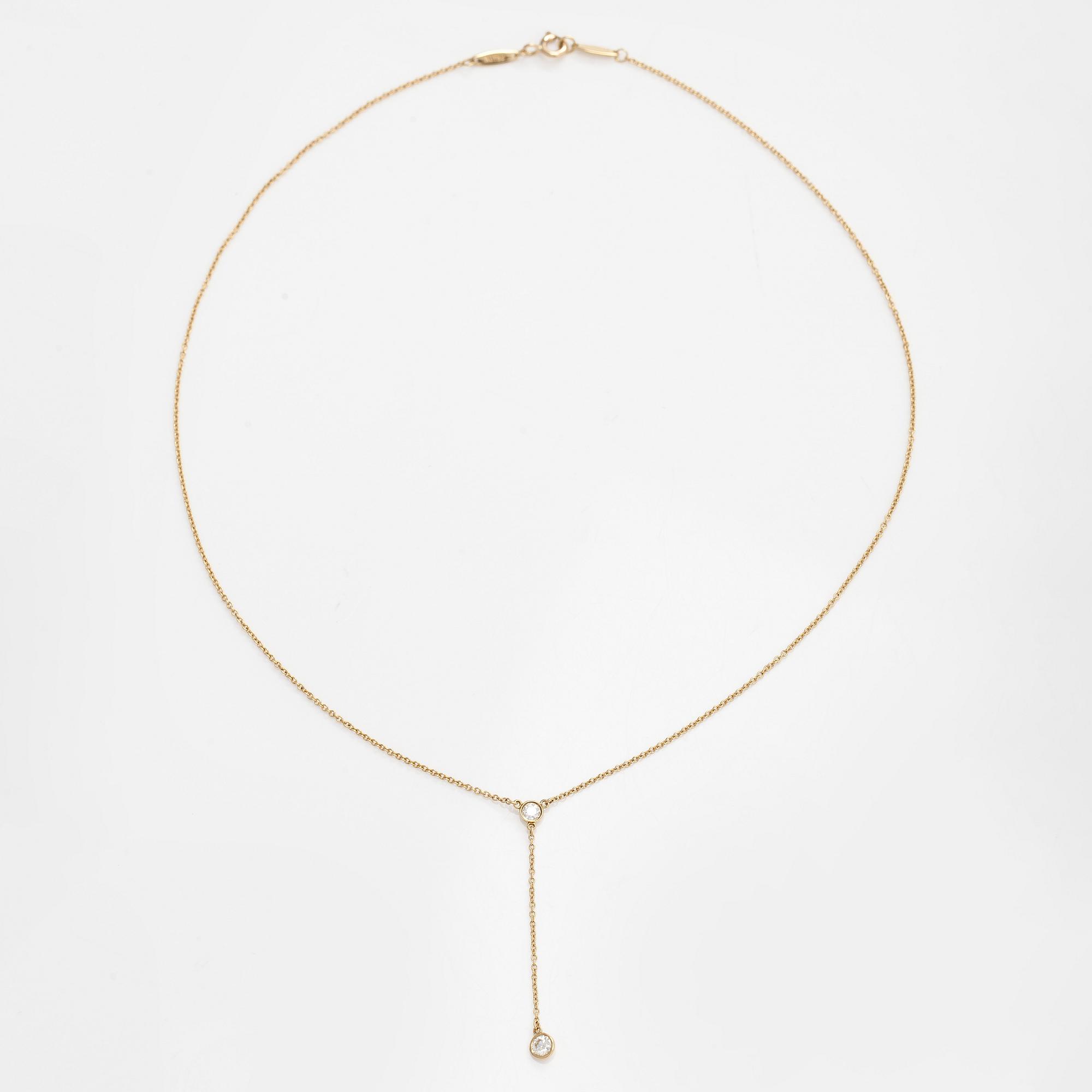 Tiffany & Co, Elsa Peretti, kaulakoru, "Diamonds by the Yard", 18K kultaa ja kaksi briljanttihiottua timanttia.