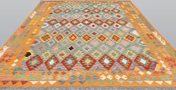 A kilim carpet, ca 342 x 256 cm.