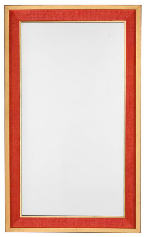 A Svenskt Tenn mirror, the frame with red fabric and gilding.