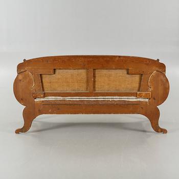 A late Empire sofa from the mid 19th century.