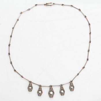 A necklace, ring and earrings, 14K gold and diamonds ca. 0.92 ct in total. Westerback, Helsinki 1964-1973.