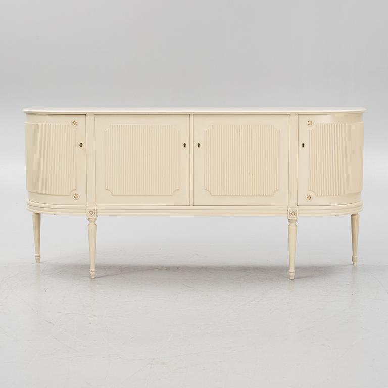 A gustavian style sideboard, mid 20th century.