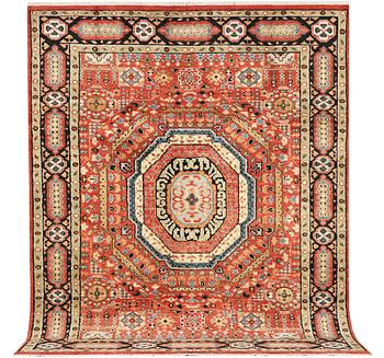 A Mamluk design carpet, c. 304 x 235 cm.