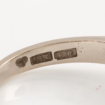 Ring in 18K white gold set with round brilliant-cut and eight-cut diamonds.