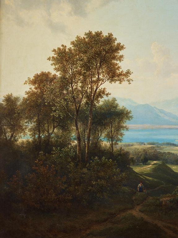 Alplandskap med sjö och slott.