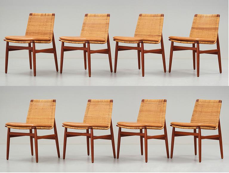 Jørgen Høj, a set of eight teak and rattan dining chairs, Thorald Madsen's Snedkeri, Copenhagen Denmark 1950's.