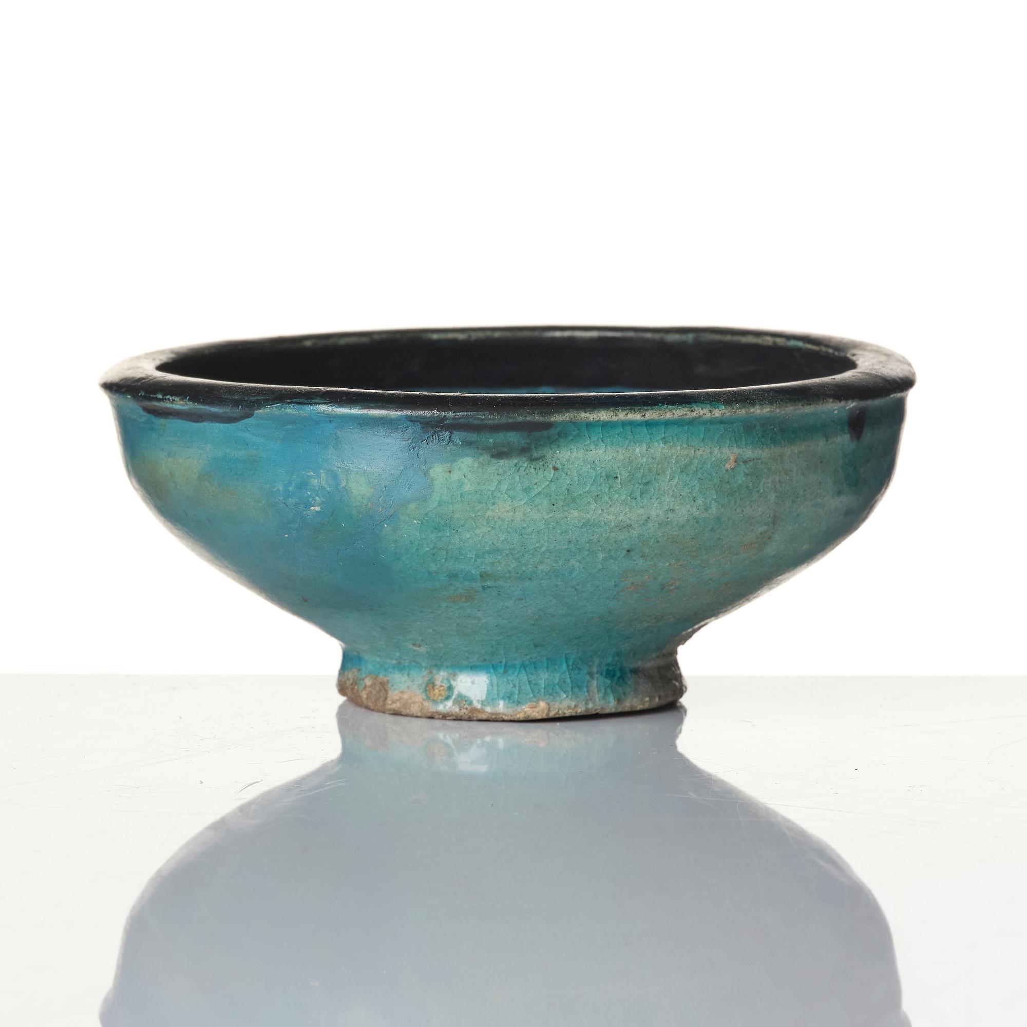 A Kashan, pottery bowl, Persia, 13th century.