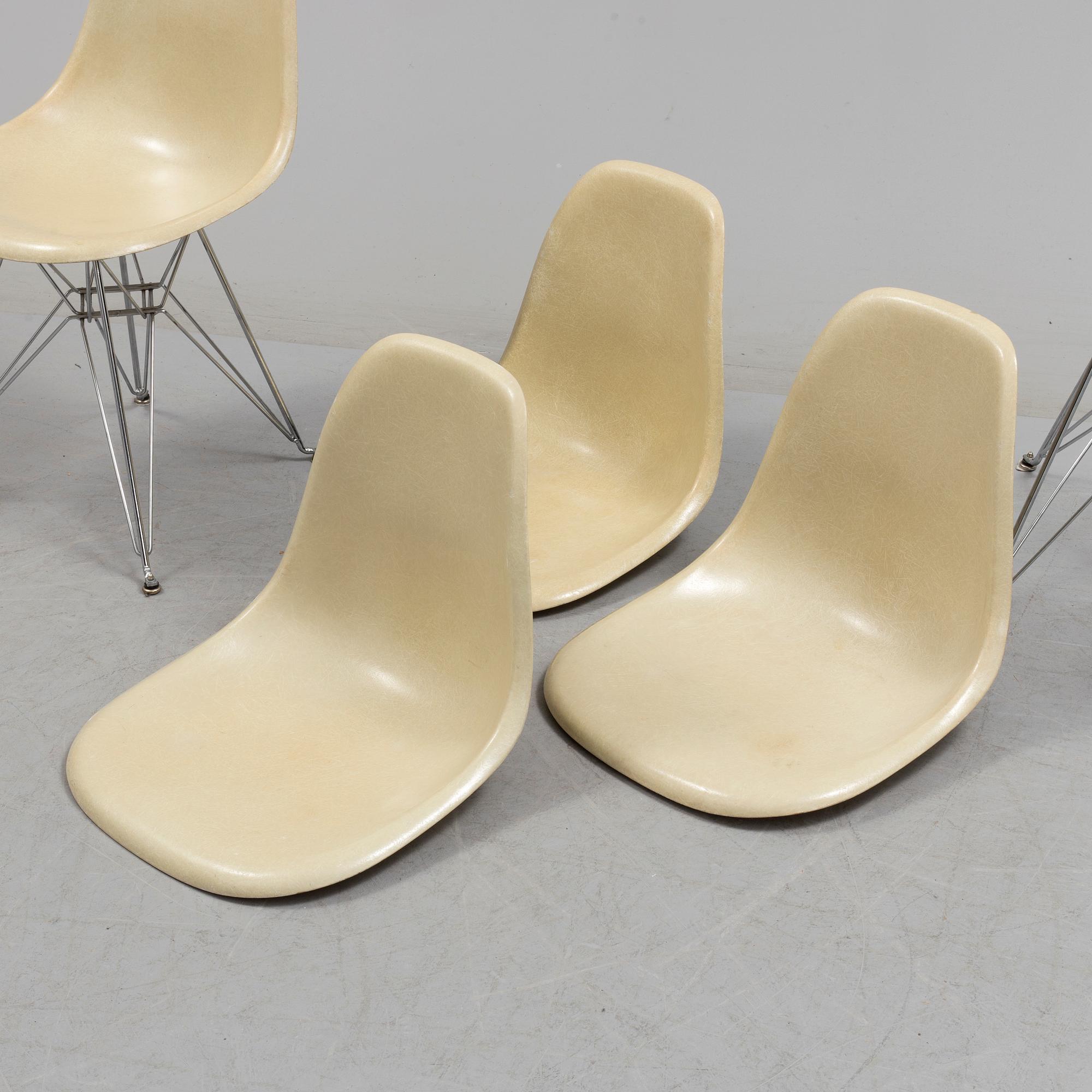 A 'DSR' chair and three loose seat  by Charles & Ray Eames for Vitra, 1960s/70s.