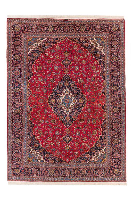 An old Keshan carpet ca 410 x 295 cm.