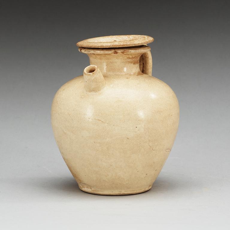 A cream glazed ewer with cover, Tang dynasty (618-907).