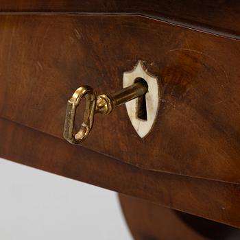 A Swedish Empire mahogany center table, early 19th century.