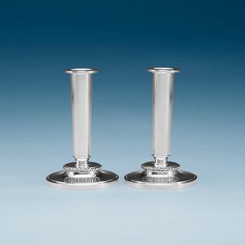 762. A pair of W.A. Bolin silver candlesticks, Stockholm 1949.