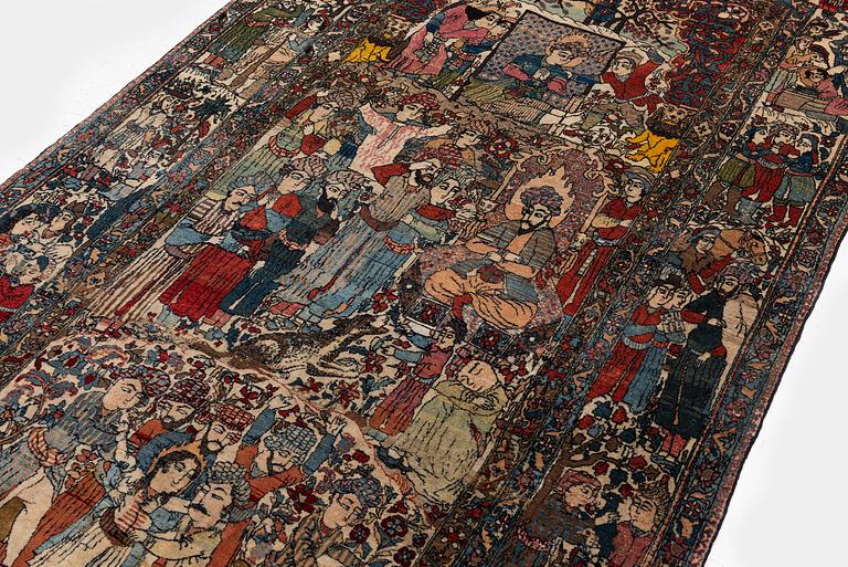 An antique Isfahan carpet, Central Persia, c. 260 x 138 cm.