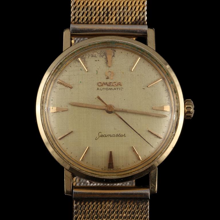 HERRARMBANDSUR, guld på stål, "seamaster", Omega. 1960-tal.