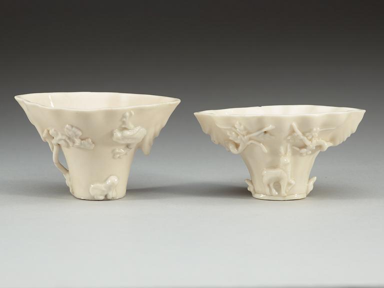 A set of two blanc de chine libation cups, Qing dynasty.