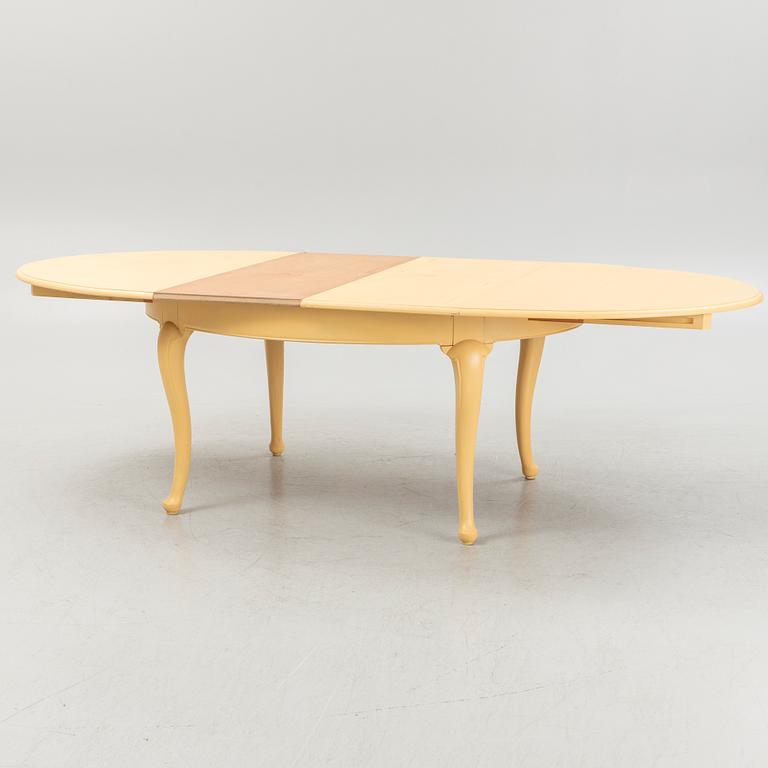 A 13-piece Rococo style dining room furniture suite, 20th Century.