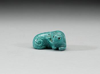 A robins egg glazed figure of a reclining elephant, Qing dynasty, presumably Qianlong (1736-95).